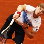 David Goffin in action against Roger Federer