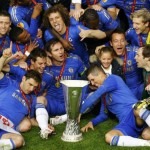 Chelsea's players celebrate with the trophy after defeating Benfica in their Europa League final soccer match at the Amsterdam Arena