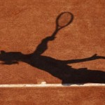 A view shows the shadow of Li of China on Court Philippe Chatrier as she serves to Medina Garrigues of Spain at the French Open tennis tournament in Paris