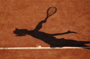 A view shows the shadow of Li of China on Court Philippe Chatrier as she serves to Medina Garrigues of Spain at the French Open tennis tournament in Paris