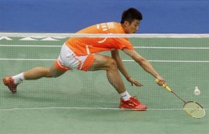 China's Chen Long plays against China's Du Pengyu during their men's singles finals of the Badminton Asia Championships in Taipei Arena