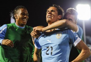 hi-res-184746117-edinson-cavani-of-uruguay-celebrates-a-score-goal_crop_north