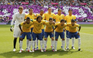 Brazil's players pose for a team picture before their men's football gold medal match against Mexico at Wembley Stadium during the London 2012 Olympic Games