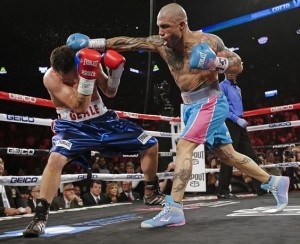 cotto-colgara-los-guantes-luego-de-su-pelea-de-este-sabado